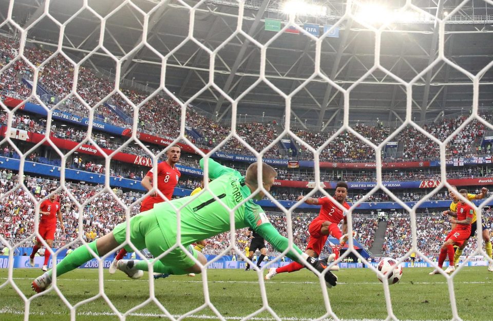 Pickford scrambles in a desperate attempt to reach the low shot from Viktor Claesson as Sweden push for a way back into the game
