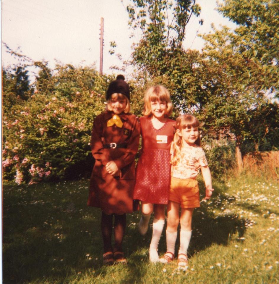  Dawn in her Brownie uniform in a family pic