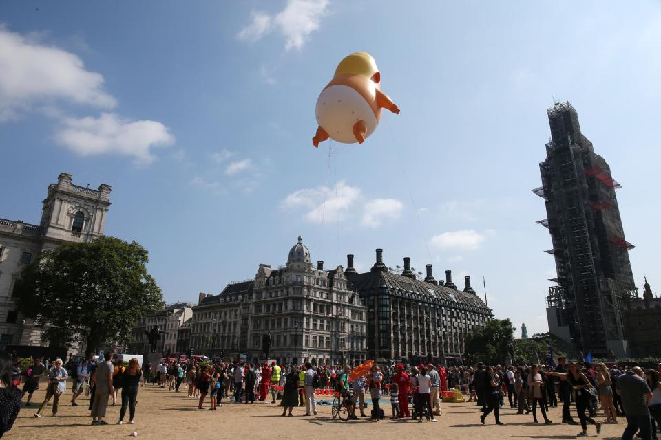 The balloon rose to fly around 10 metres off the ground, next to Parliament and the River Thames