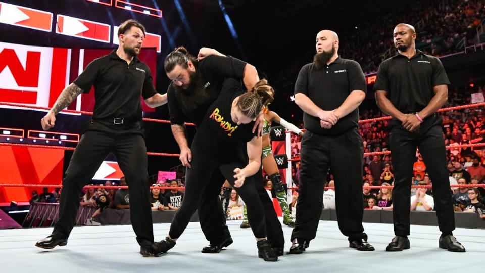 The UFC legend smashed through Alexa Bliss' security team on Raw