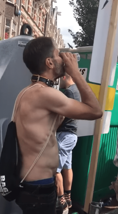  Bizarre footage shows a party-goer downing what appears to be urine at a festival in the Netherlands