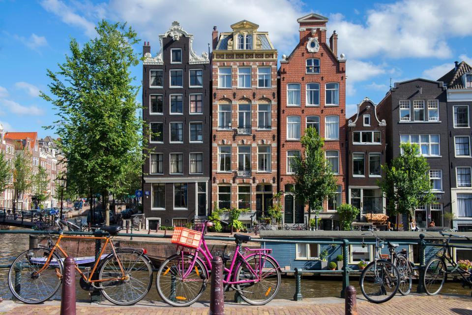 Canal houses and bicycles along Herengracht in Amsterdam