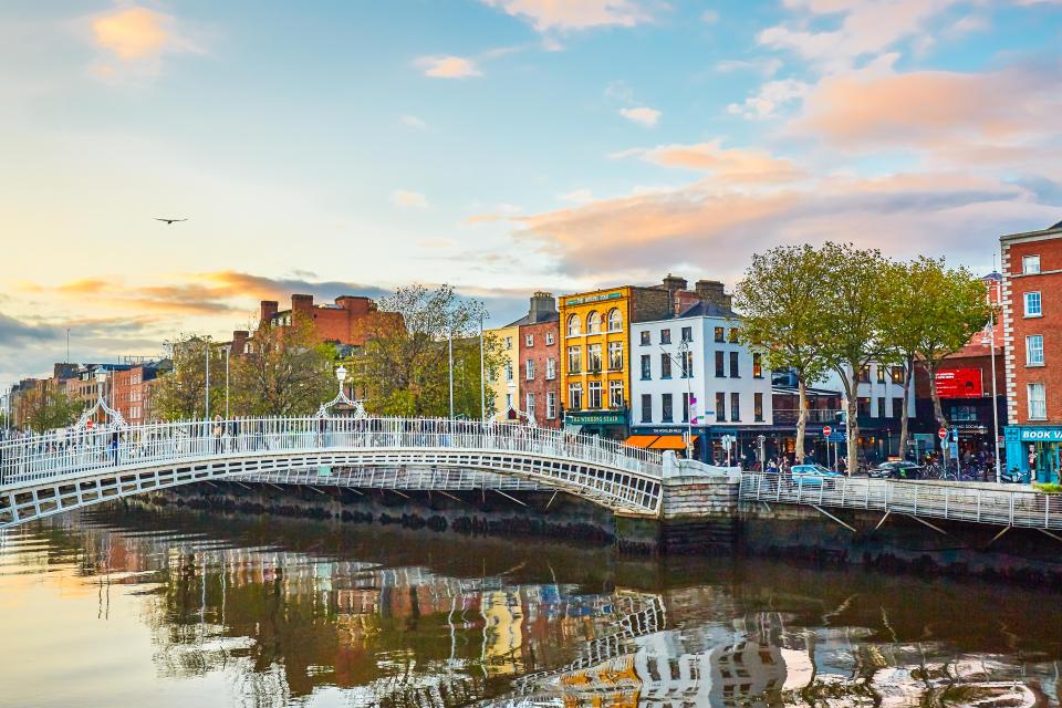 The Ha'penny Bridge over the River Liffey in Dublin, Ireland.