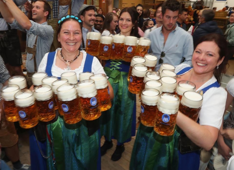 And these women serving the beer are quite possibly the most popular in the room