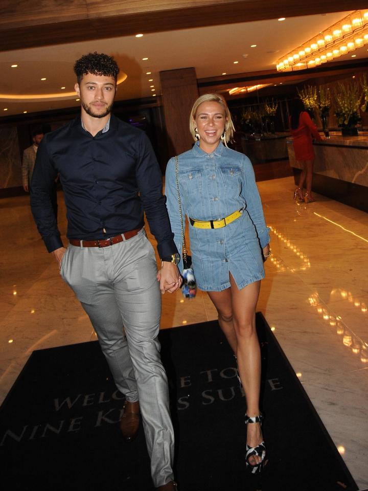  The couple looked loved up as they made their way out of the Royal Lancaster Hotel
