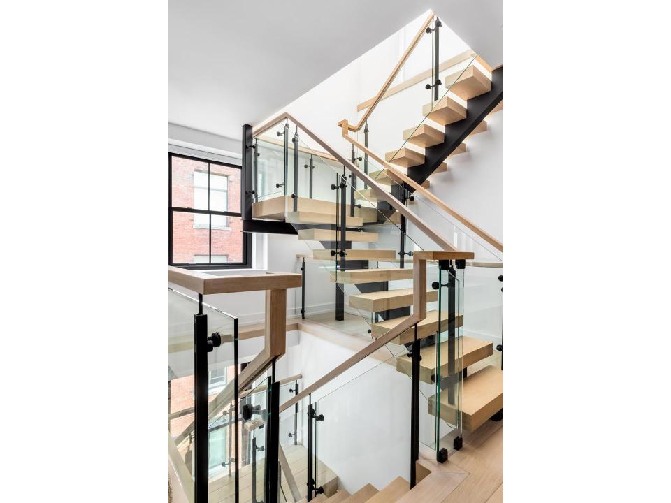  The stairs are made of wood and glass