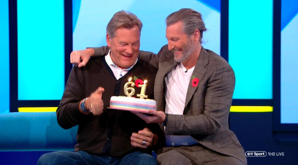 Glenns 61st birthday was marked with a surprise cake presented by Robbie Savage