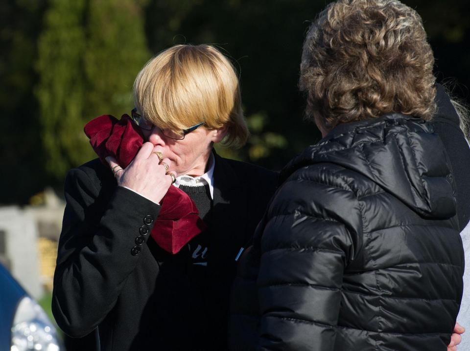 Pauline's niece is seen in tears today at the cemetery 