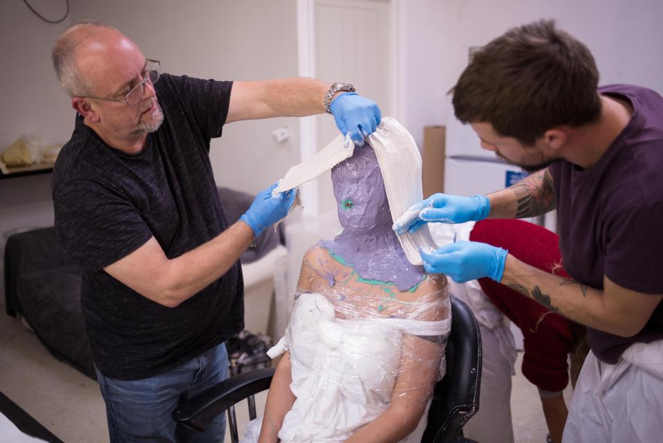  The special effects team take a mould of Rhian's face