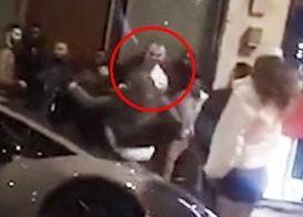  The bouncers wrestles with the men during the chaos outside the property in Park Lane in the early hours of New Year's Eve