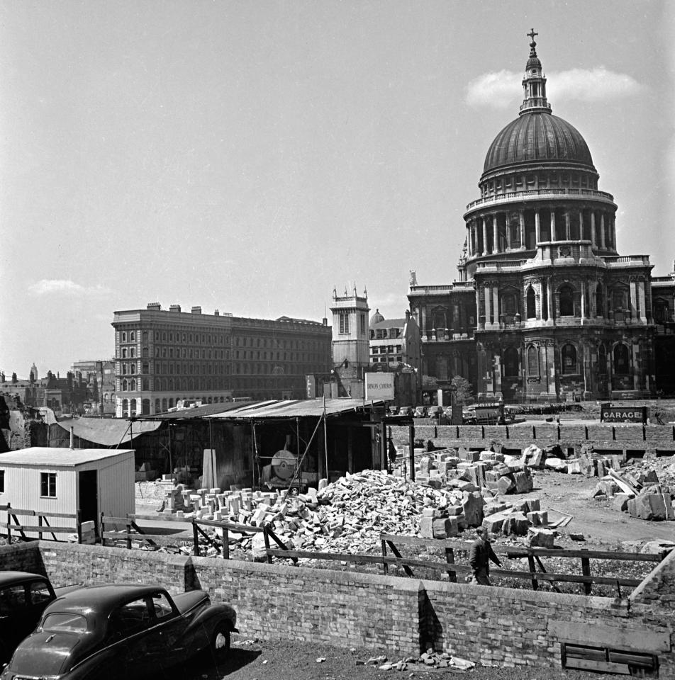  In the shadow of St Paul's Cathedral, workmen are busy salvaging from the rubble of a blitzed church masonry which can be used elsewhere