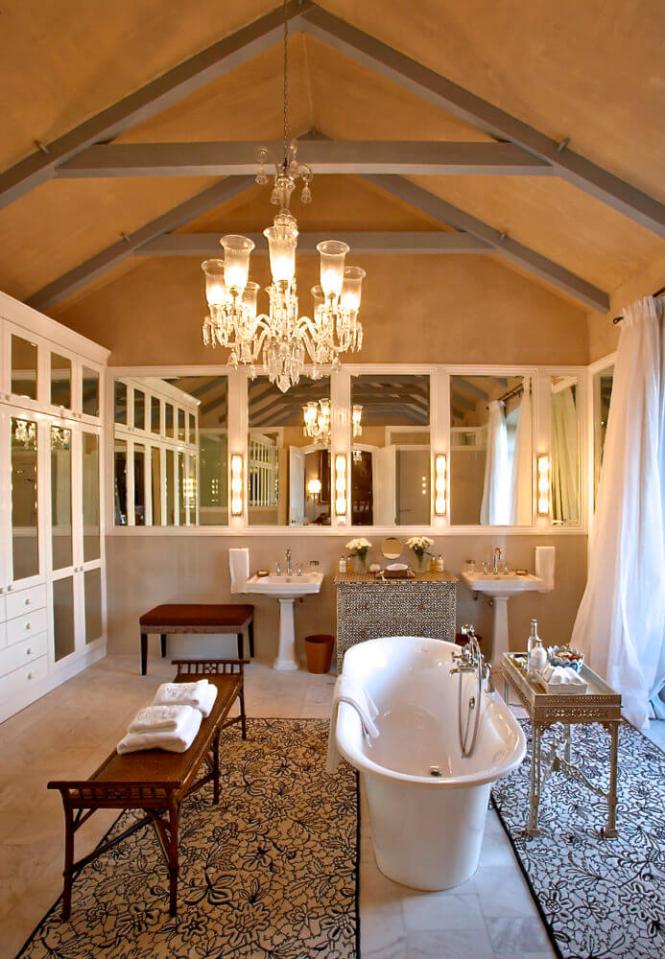  The luxurious bathroom with a freestanding bath-tub and walk-in shower - there are 11 suites in the hotel, as well as five vineyard suites