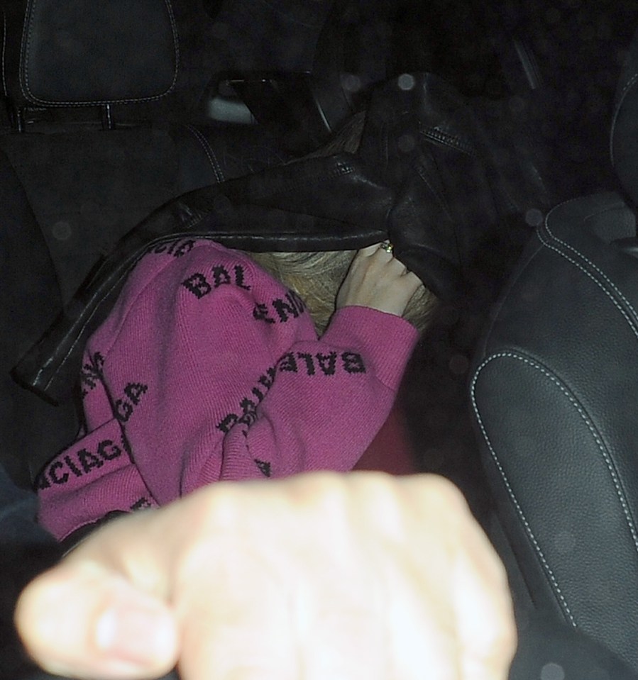  Amber Davies hid her face as she left the venue