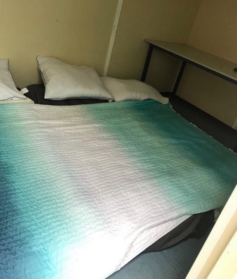 Instead he found a bed in a shipping container