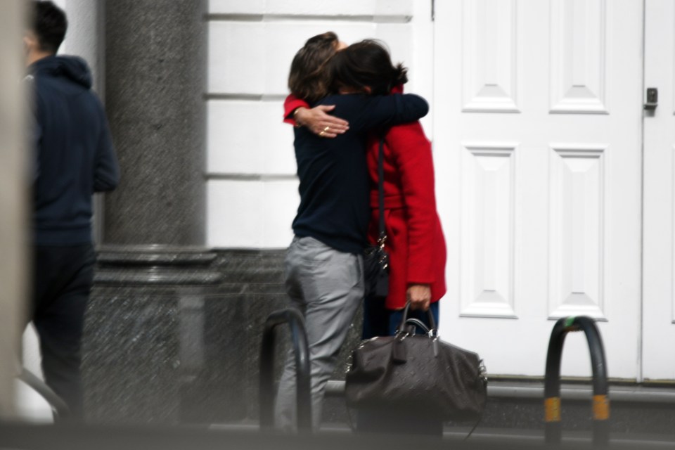 Davina and Michael, who have been friends for over 20 years, snapped canoodling on Monday