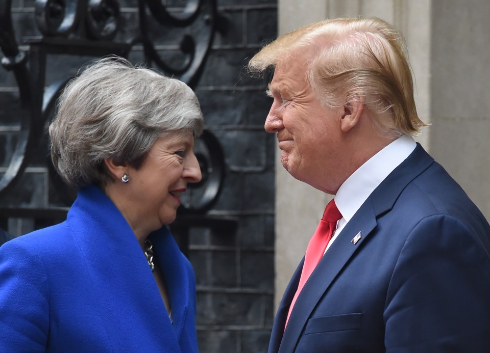  Theresa May has attacked President Trump's comments about a group of Congresswomen