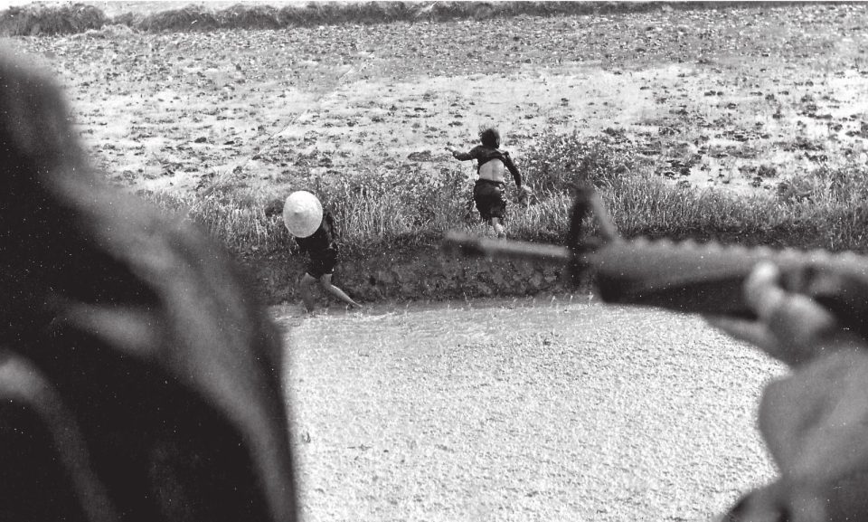  US war photographer Tony Swindell says this picture shows 'a Vietnamese teenage girl in the top photo being shot dead from a command chopper on a VR (Visual Recon) mission. It was SOP (Standard Operating Procedure) to shoot civilians who ran, and it almost became a sport'