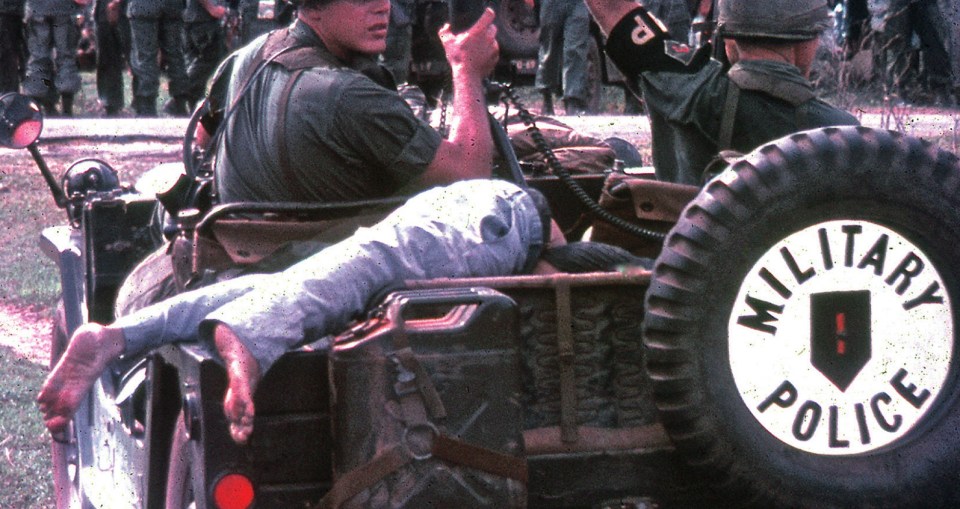  A jeep loaded up with bodies of dead Viet Cong