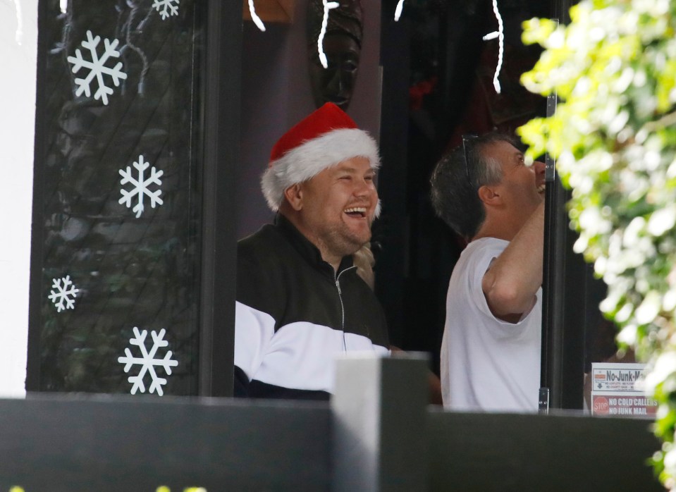  The actor was clearly in character as he wore the festive hat