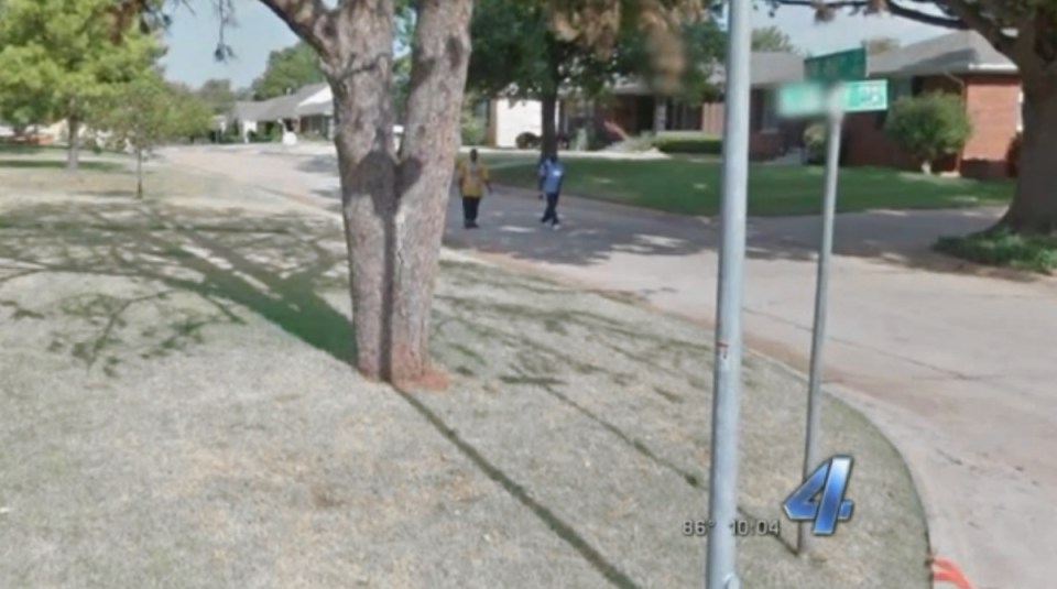 Google Earth snapped these two men on the same street as a house that they allegedly robbed that day