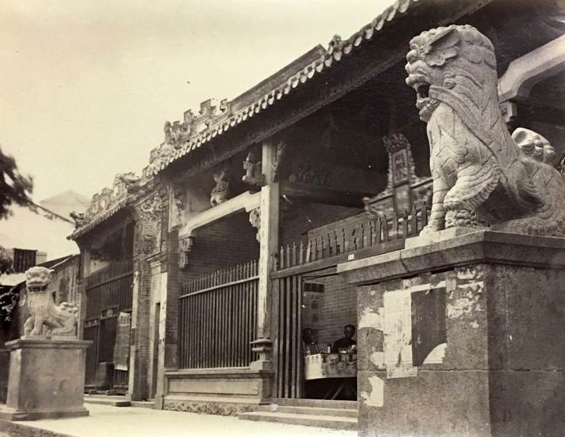  Ornamental dragons stand guard outside 'Joss House'
