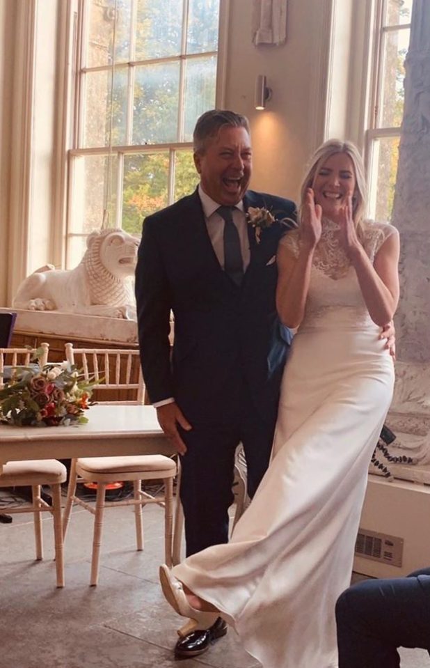  The happy couple clap and laugh after saying I Do