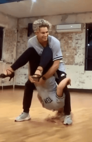  Saffron was in hysterics as AJ lifted her down from the flip