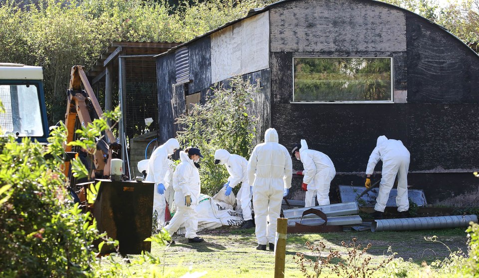 Forensic officers at the farm in Gosmore, Herts