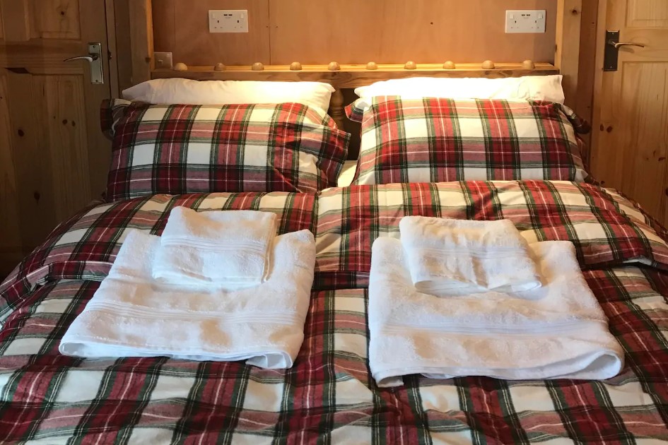 A four poster bed and a sofa bed are included
