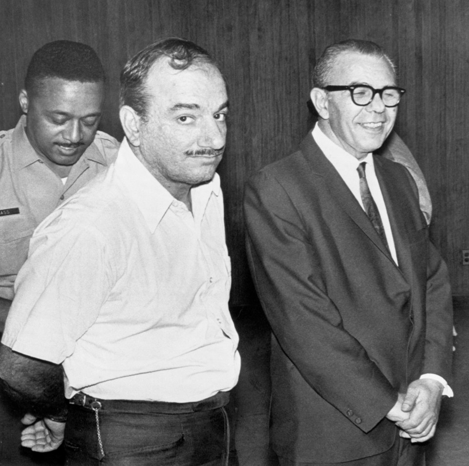 Phil Testa, also known as The Chicken Man, is seen handcuffed