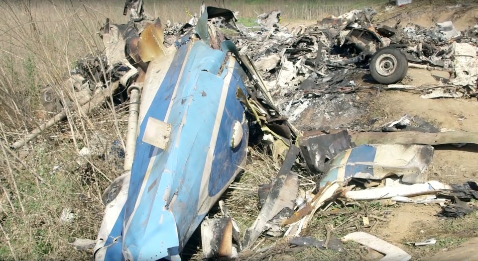 A piece of the doomed helicopter is seen at the crash site in Calabasas, CaliforniaA piece of the doomed helicopter is seen at the crash site in Calabasas, California