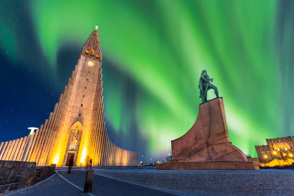  The Aurora Borealis over hallgrimskirkja church in Reykjavik