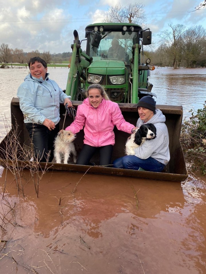  Amy Price and her parents were rescued from their home by a farmer and his tractor in Monmouthshire, Wales