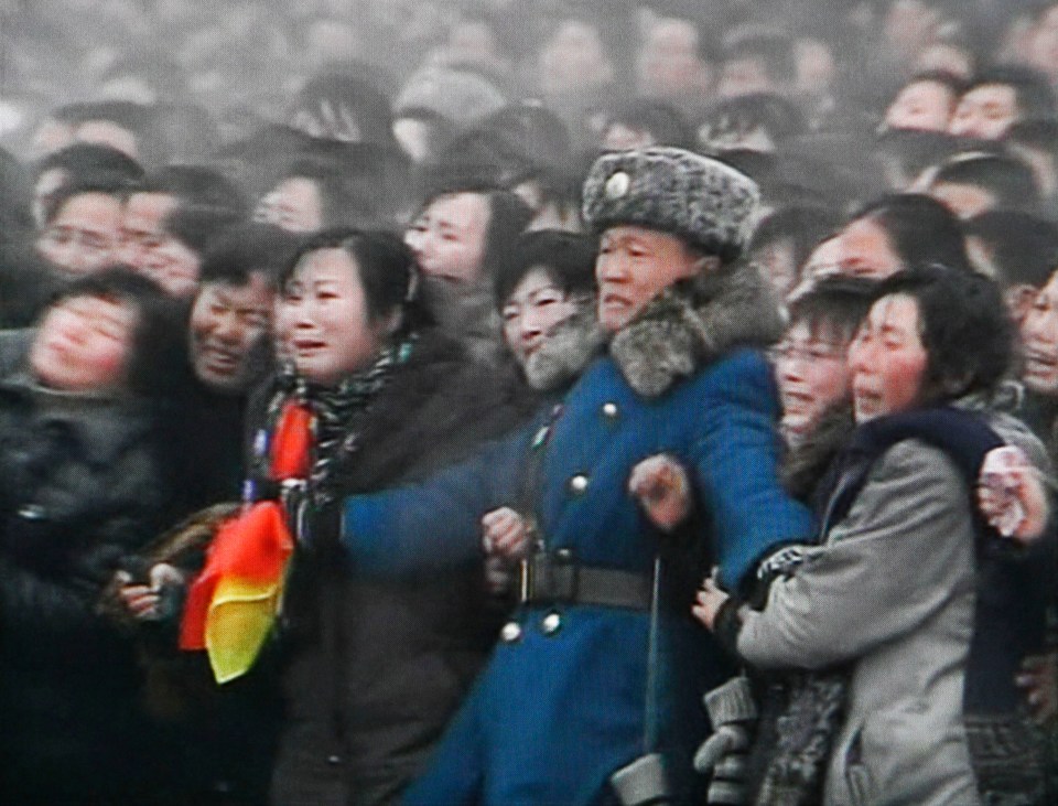  North Koreans cry in public following Jong-il's death