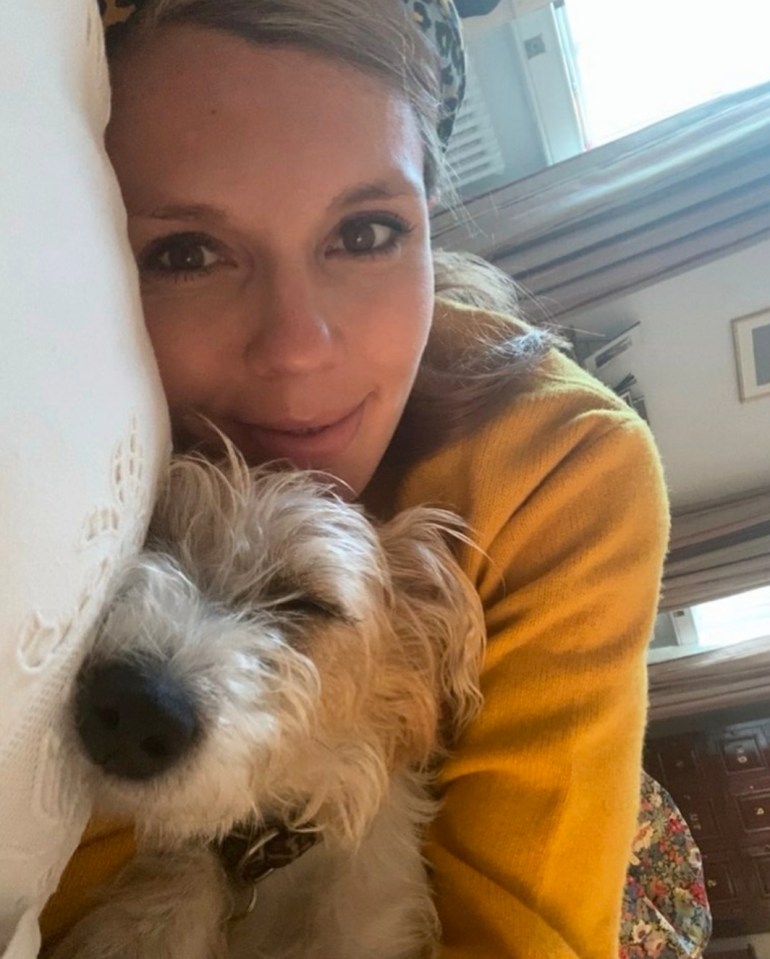  Carrie pictured with dog Dilyn while self isolating with coronavirus