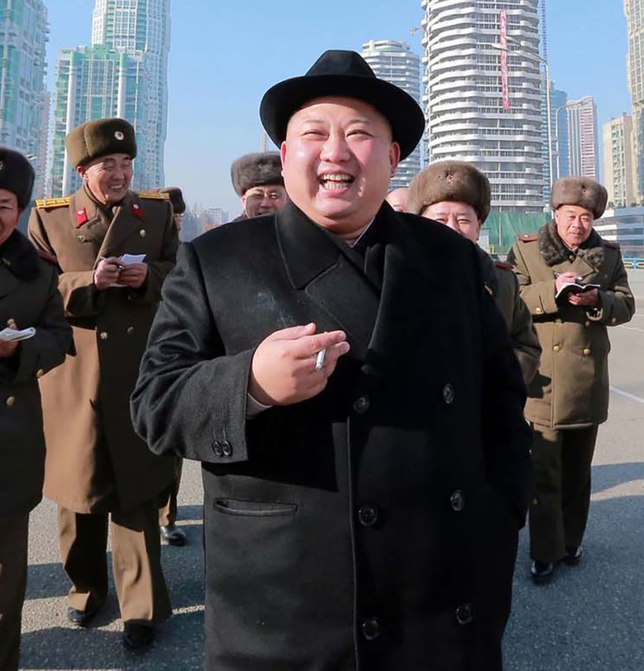  Kim Jong-un clutching a cigarette as he inspecting housing blocks on January 26, 2017.