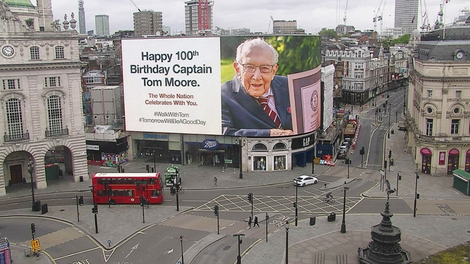  A tribute to World War Two veteran Captain Tom Moore displayed on lights in London's Piccadilly Circus on his 100th birthday