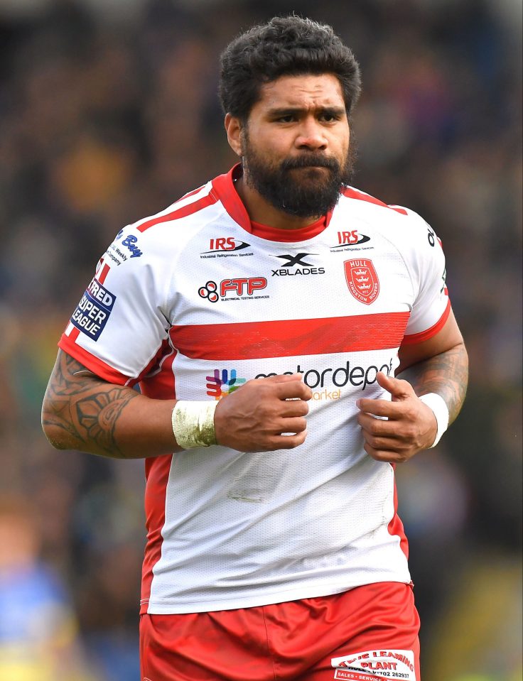 a man in a red and white xblades jersey