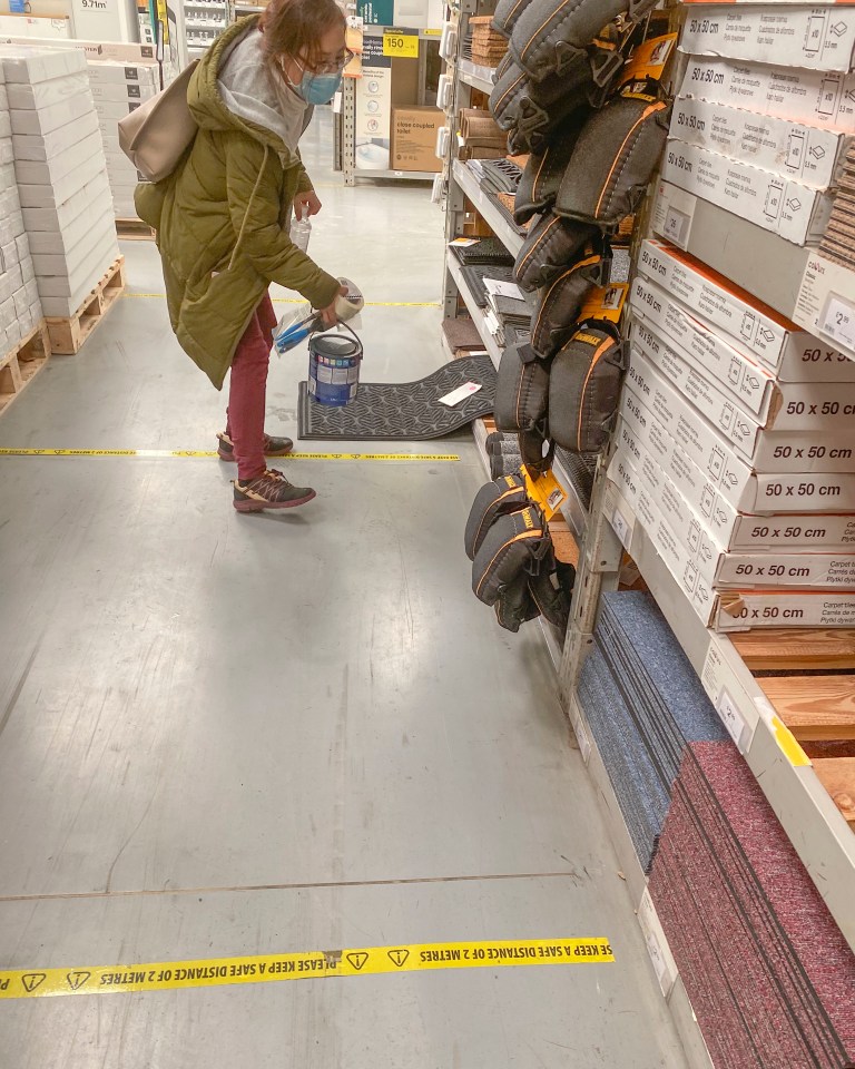 Shoppers must stay in between the yellow markings to adhere to the social distancing measures