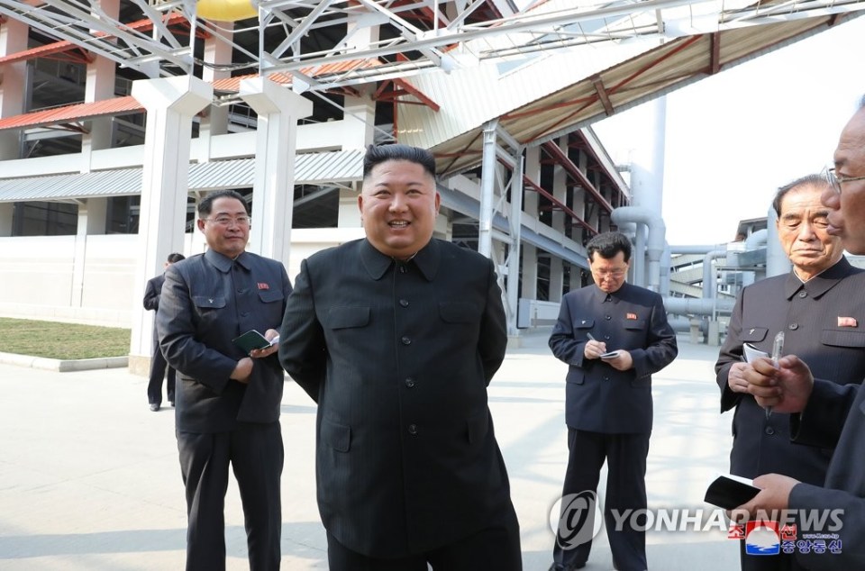  Very much alive - according to North Korea's state media, which shared pics of the leader after he'd been missing for 20 days
