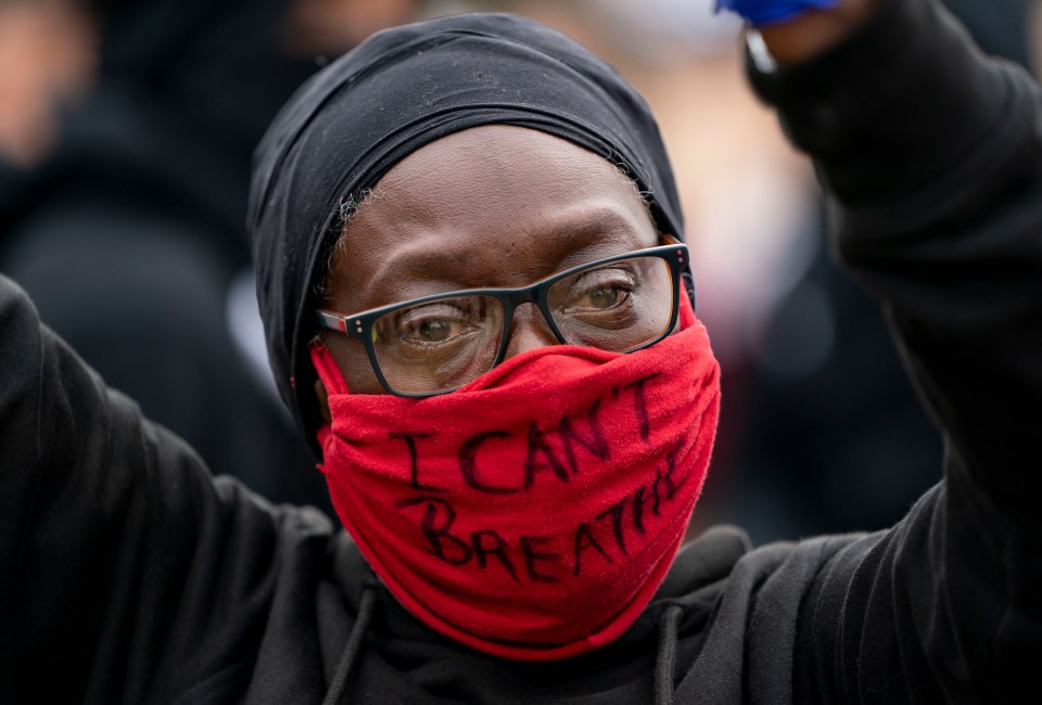  Protesters wore facemasks reading 'I can't breathe'