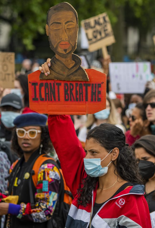  Demonstrators held up pictures of Mr Floyd with the words "I can't breathe"