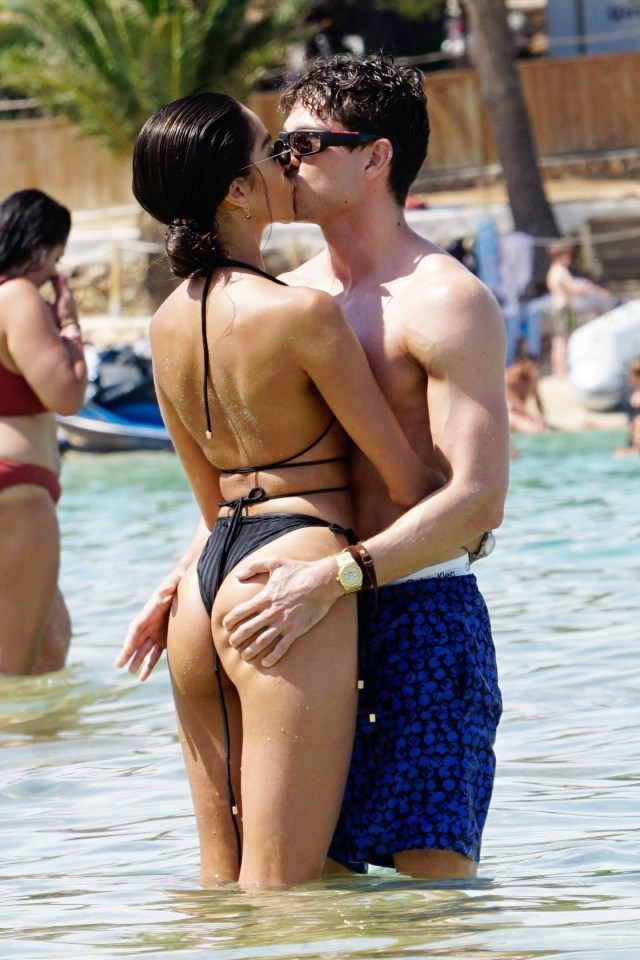 Joey Essex grabbed new model girlfriend Brenda Santos’s bum as they kissed on the beach in Ibiza