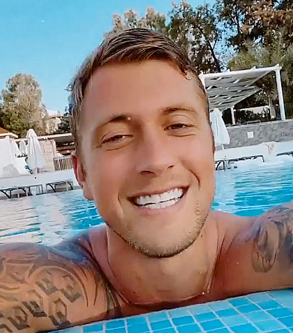 Dan flashed his gnashers in the pool in Turkey
