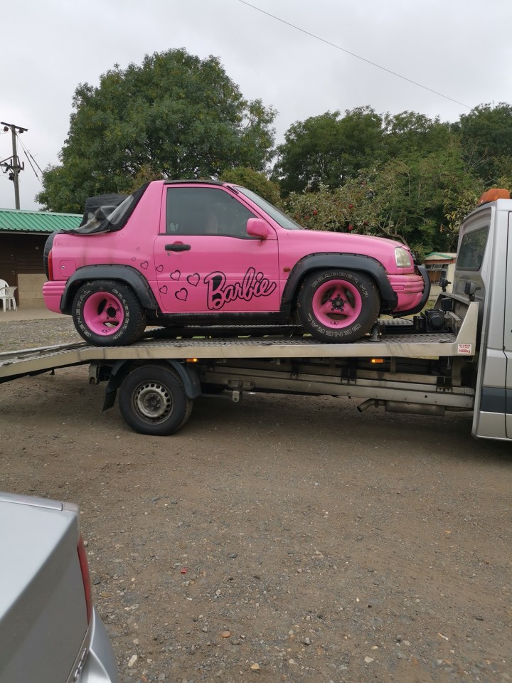 Katie Price's pink 'Barbie' car has been returned to her drive by her ex Kris Boyson