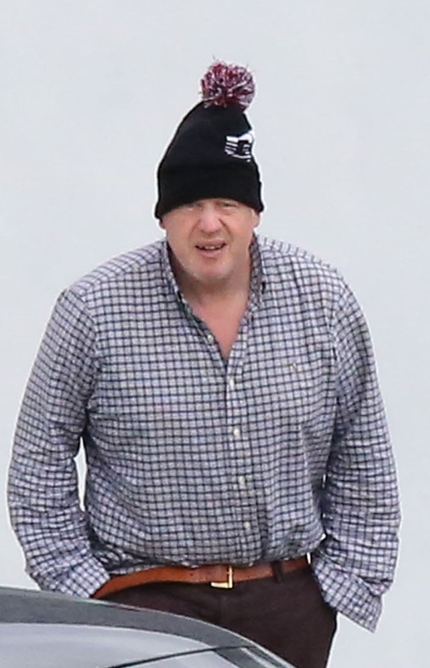 Boris Johnson was snapped wearing a bobble hat during his holiday in Scotland