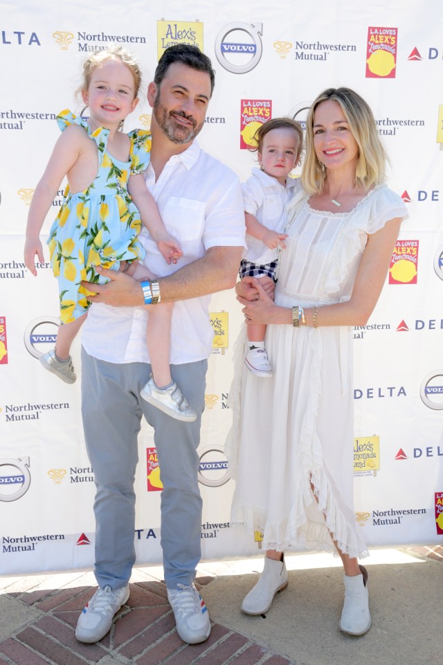 Jimmy Kimmel, his wife Molly McNearney, and their two children at an event.