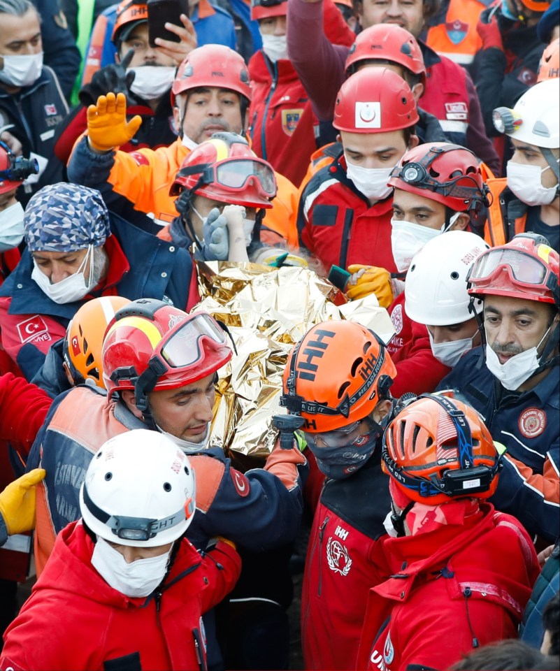 Rescuers cried out in delight and hugged eachother when Elif was discovered alive
