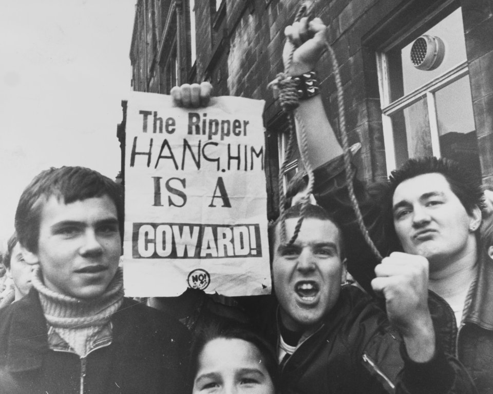 Protesters wait outside court after Sutcliffe was finally caught