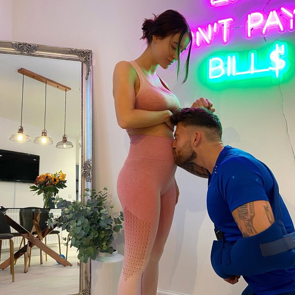 Jake Quickenden kisses girlfriend Sophie's bump